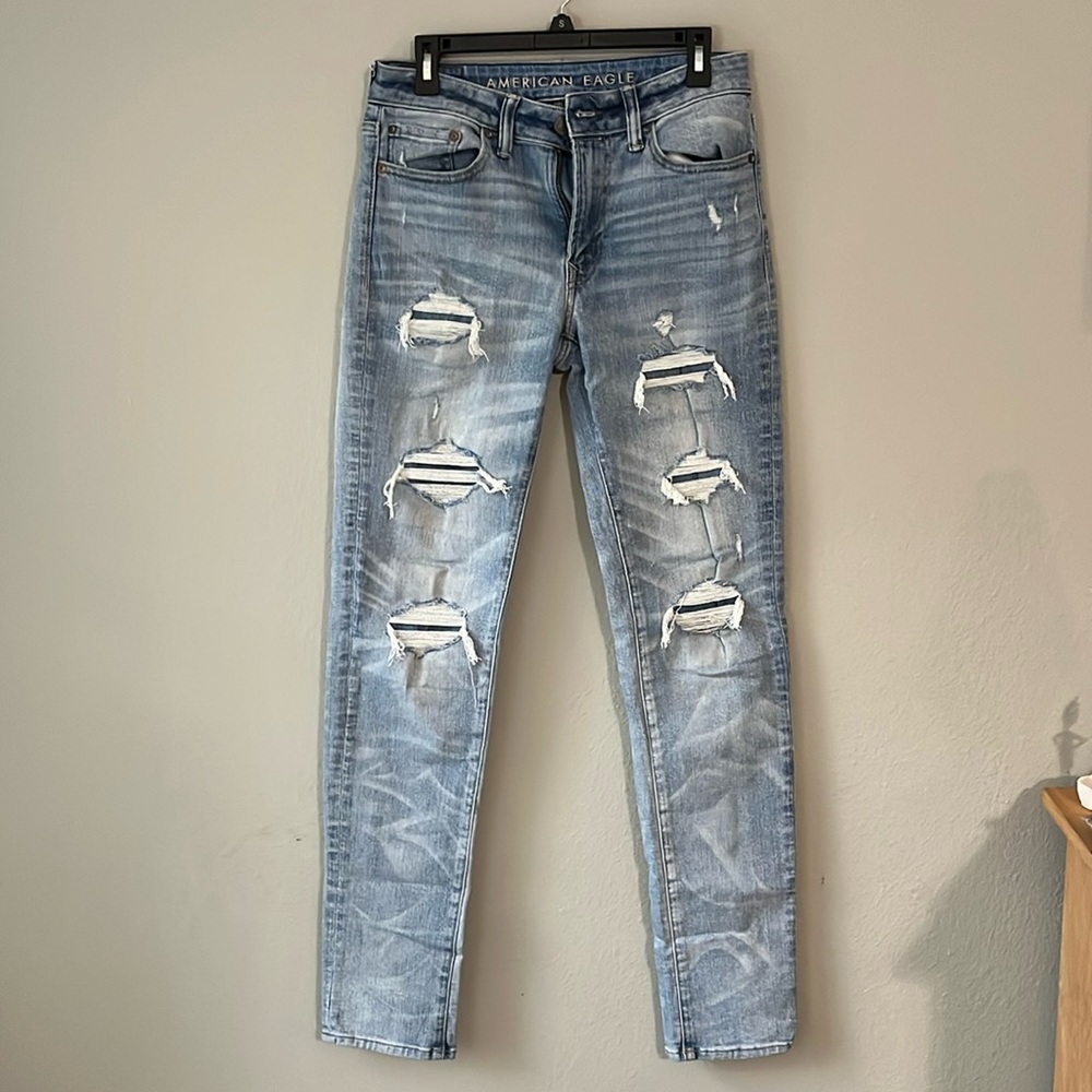 American Eagle light wash slim destructed jeans size 30x34